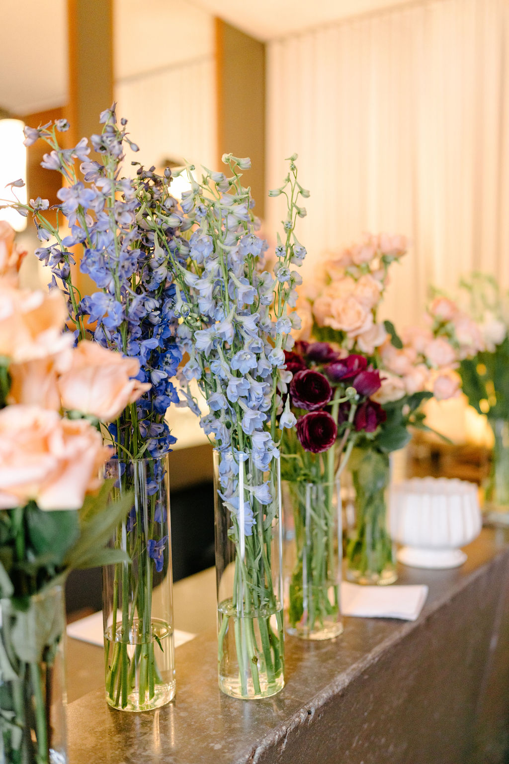 Beautiful flower arrangements in tall vases
